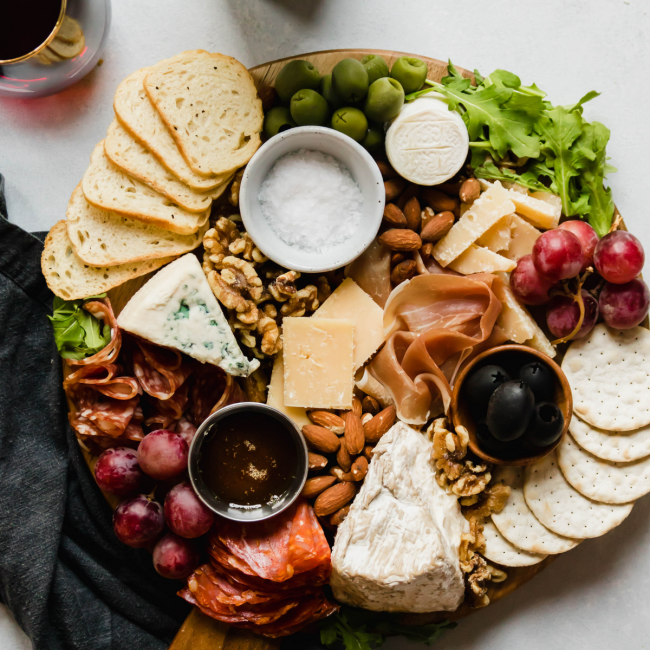 Artisanal Cheese Platter with Nuts and Honey